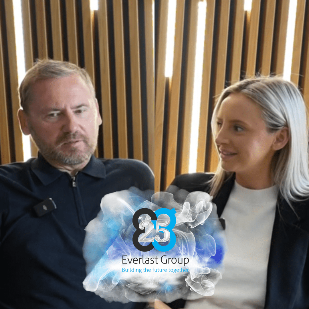 A Father–Daughter Duo chats, with the 25 Everlast Group logo between them. Sophie Kitching and Damian Maclean. EG25