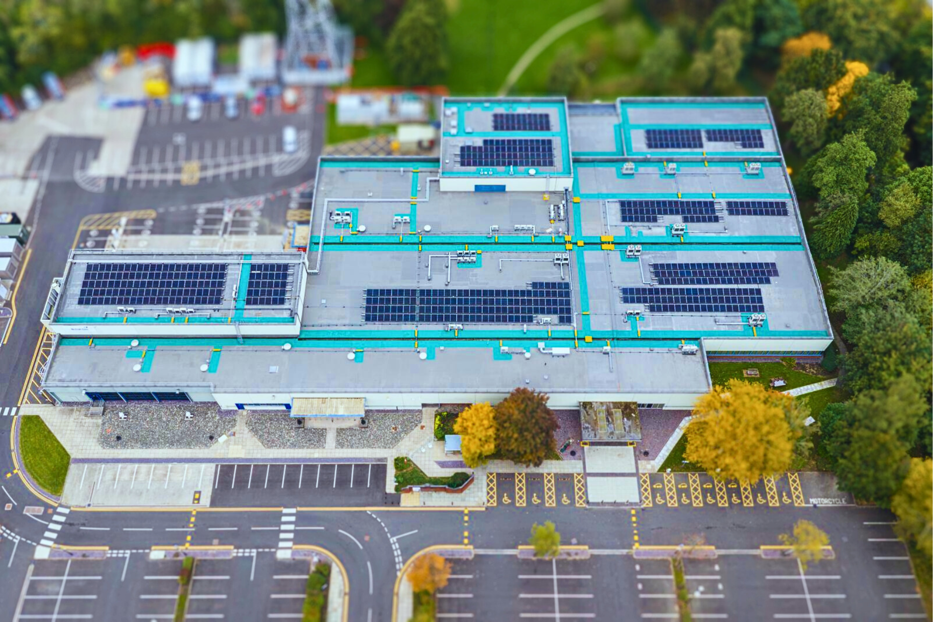Aerial view of a large building with solar panels, ideal for construction networking Leeds events. British Gas Stockport, Everlast Group and Westwood Liquids. LRWA Finalist 2026
